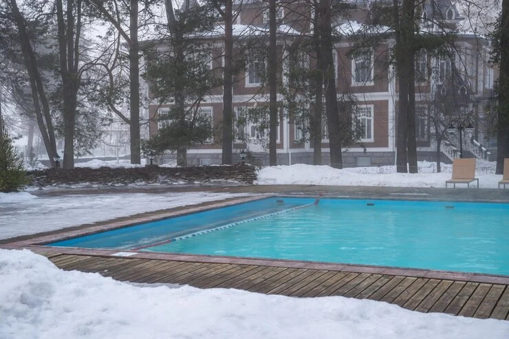 how to maintain a backyard pool in the winter